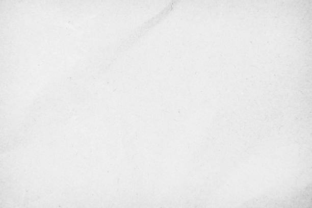 istock White recycled craft paper texture as background. Grey paper texture, Old vintage page or grunge vignette of old newspaper. Pattern rough art creased grunge letter. Hardboard with copy space for text. 1208562880