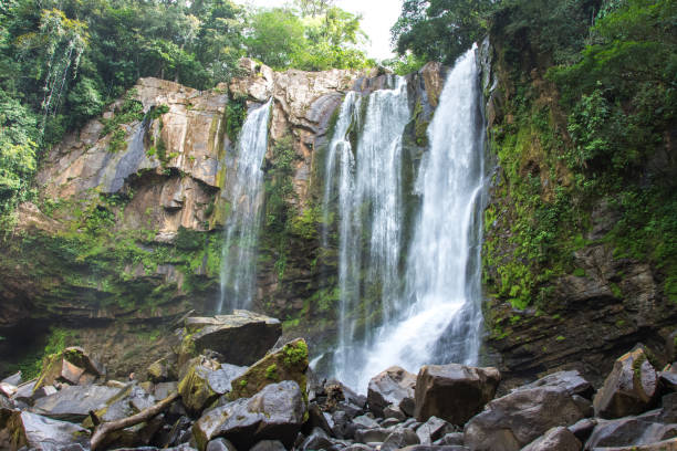 istock Tropical Waterfall located in Costa Rica. 1208565141