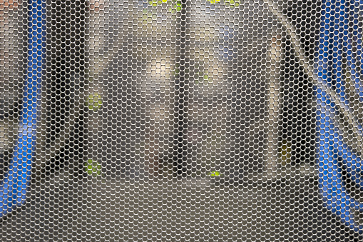 Background grid in the server room with wires from technological equipment, copy space