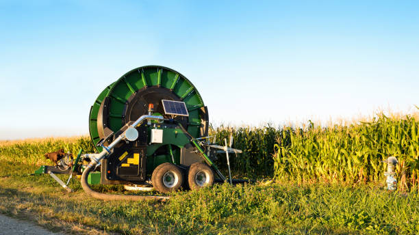 istock Agricultural irrigation system with a big hose reel 1208568849