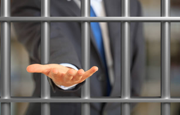 istock Man in suit offering a palm 1208569136