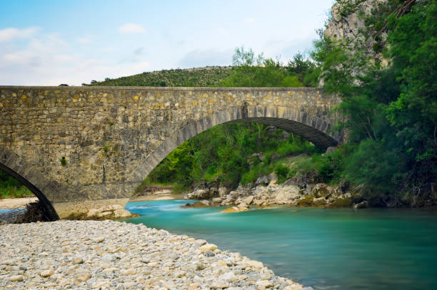 istock An old bridge over the river in French Provence. 1208570541