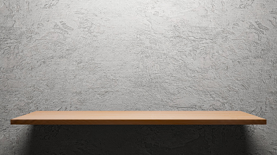 Wooden empty shelf  on cement wall background for show product.