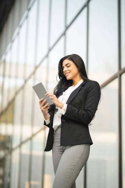 istock Businesswoman working on digital tablet 1208572400