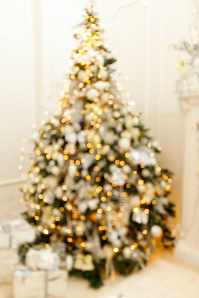 istock Defocused Christmas decorations and blurry Christmas lights 1208573650
