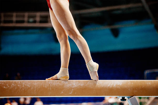 istock legs women balance beam gymnastics 1208574225
