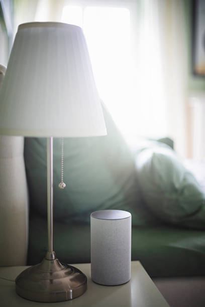 istock Smart speaker in the bedroom on the bedside table 1208574907