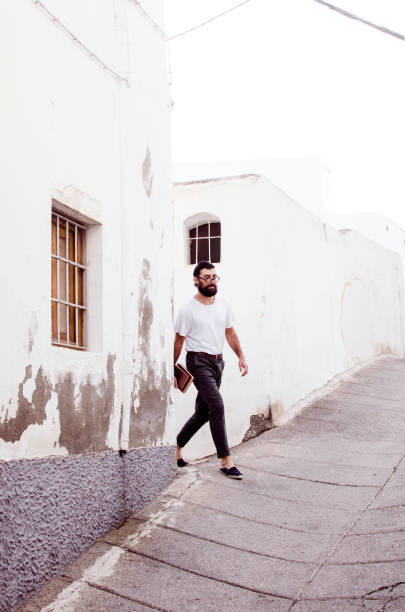 istock walking through the streets of a town 1208575611