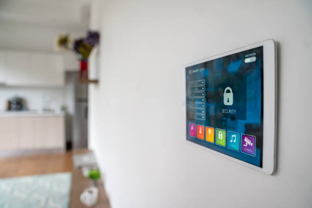 istock Close-up on a tablet computer controlling an intelligent home 1208577999