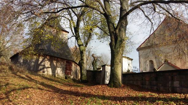 istock old church and bell tower with linden tree 1208578450