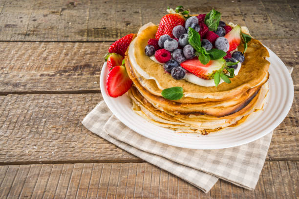 istock Sweet crepes with berries 1208579843
