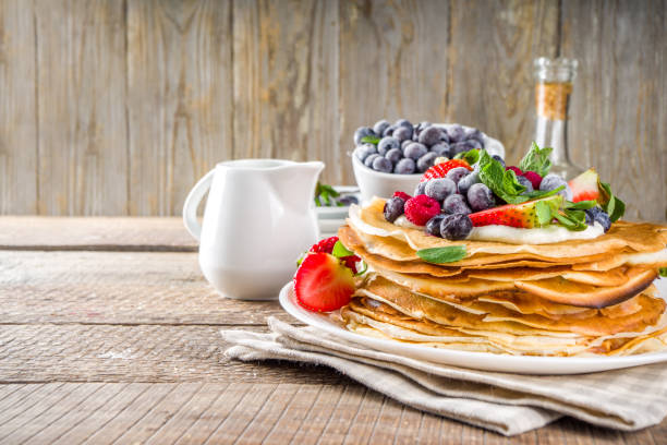 istock Sweet crepes with berries 1208579936