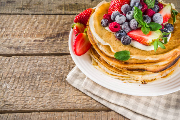 istock Sweet crepes with berries 1208579992