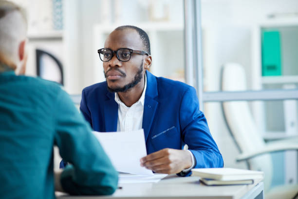 istock African Businessman Talking to Candidate 1208580377