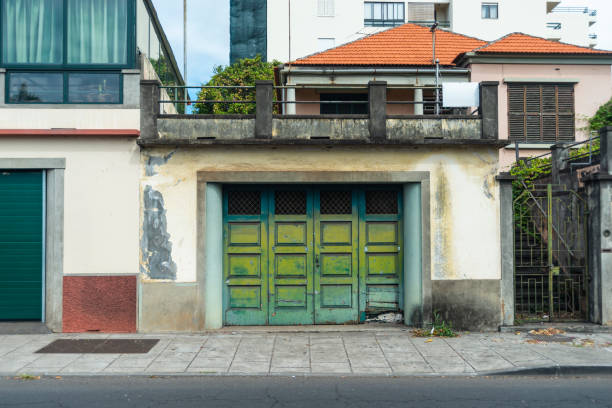 vintage green color garage door on city street