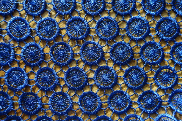 istock Blue crochet lacy fabric on wood from above 1208582440