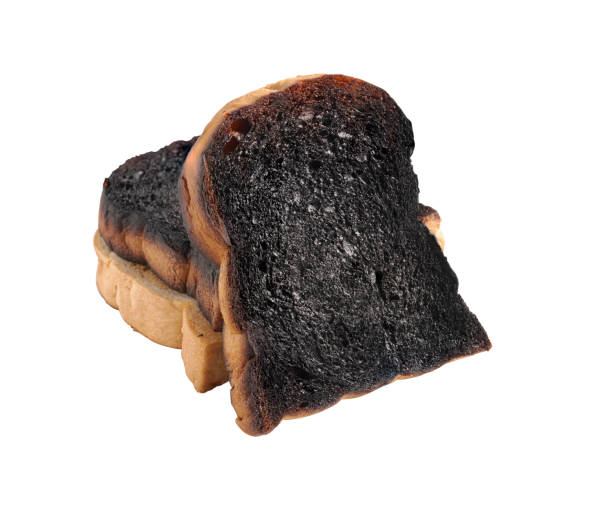 istock 3 Burnt toast slices isolated on a white background 1208582915