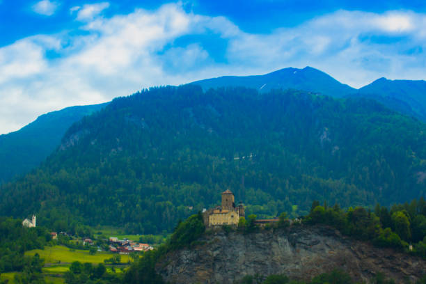 istock Alps, Switzerland in spring with bright blue skies and beautiful clouds 1208584010