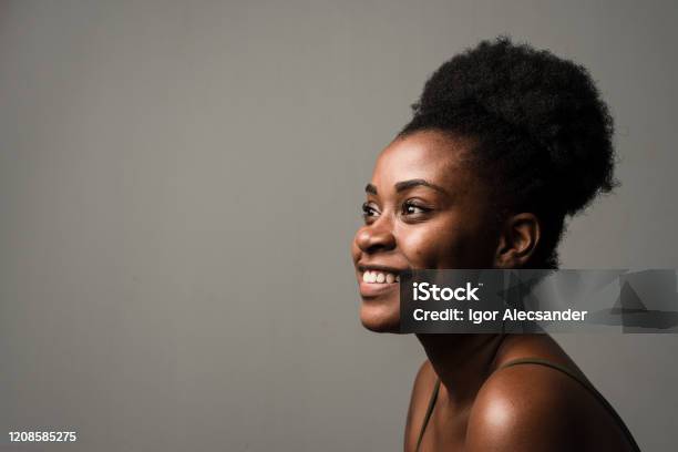 Profile Of A Serene Young Woman Stock Photo - Download Image Now - Profile View, One Woman Only, Portrait