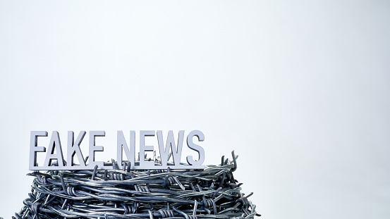 Text fake news and barbed wire