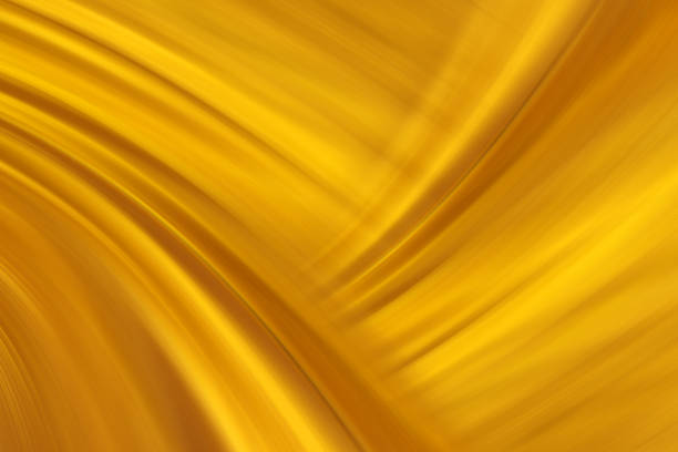 istock Curve line texture on gold color blurred background. 1208587886