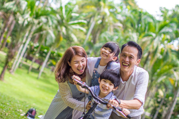 4,600+ Singapore Family Stock Photos, Pictures & Royalty-Free Images -  iStock | Singapore family eating, Singapore family home, Singapore family  fun