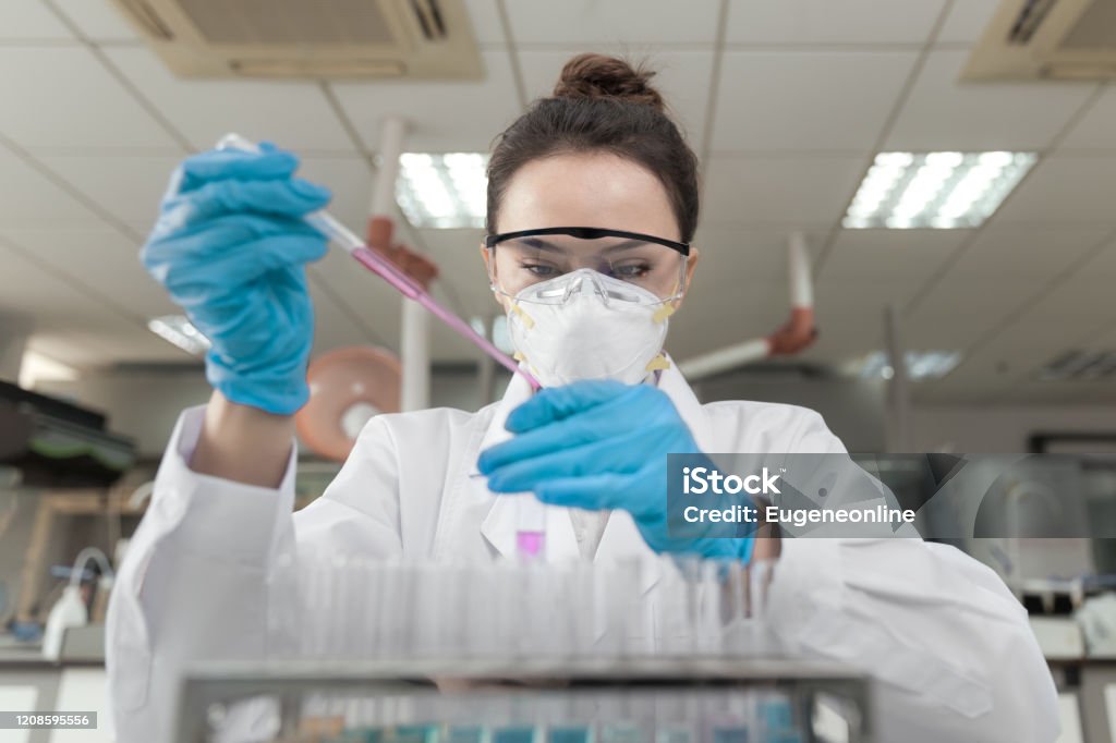 Female scientist working in the CDC laboratory. Laboratory Stock Photo