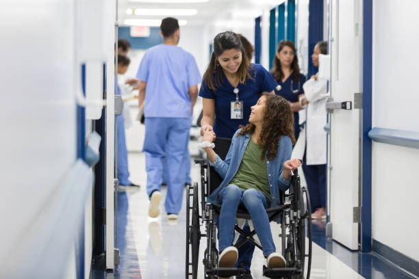 Preteen patient talks with nurse