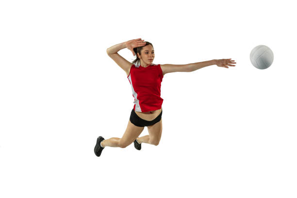 istock Young female volleyball player isolated on white studio background in flight and motion 1208598054