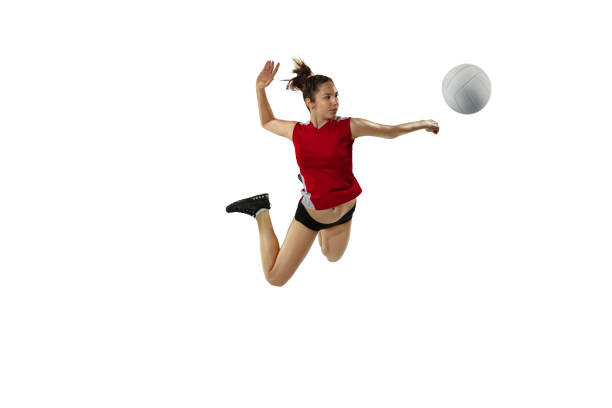 istock Young female volleyball player isolated on white studio background in flight and motion 1208598085