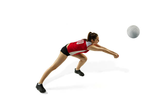 istock Young female volleyball player isolated on white studio background in flight and motion 1208598102