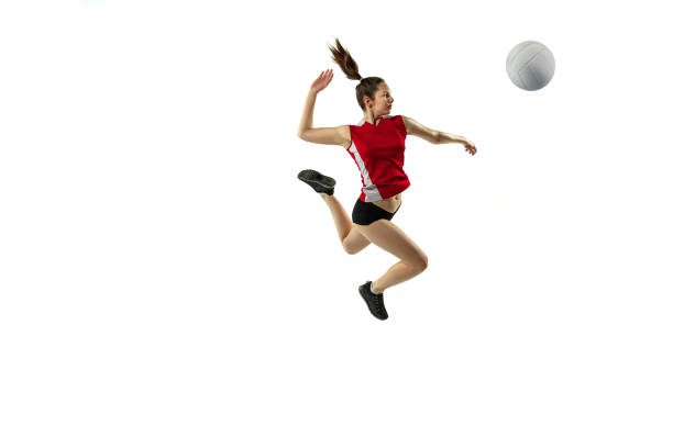 istock Young female volleyball player isolated on white studio background in flight and motion 1208598115