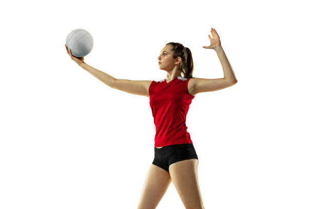 istock Young female volleyball player isolated on white studio background in flight and motion 1208598129