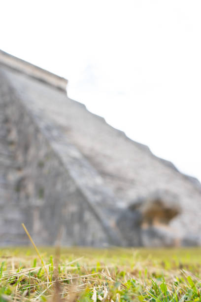 Fragment of el Castillo pyramid (Temple of Kukulcan). General view. Architecture of ancient mayan civilization. Chichen Itza archeological site. Yucatan. Mexico.