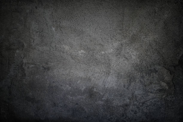 istock Black grungy faded stucco, concrete and cement pattern, Textured Background. 1208602628
