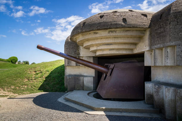 istock World War Two German artillery battery remnant at Longues-sur-Mer, Atlantic Wall fortification, Normandy, France. 1208602741