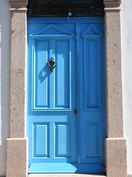 istock Blue painted wooden door 1208602881