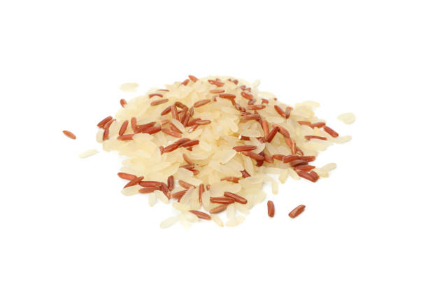 istock Rice isolated on white background, close up 1208603631
