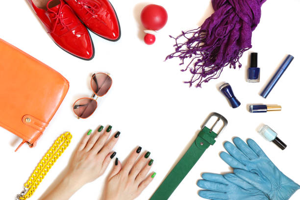 istock Rainbow design of colored accessories, decorative cosmetics and green saturated manicure 1208604293