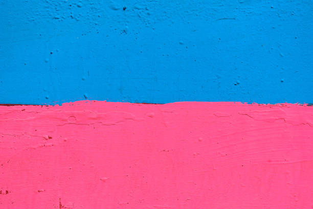 Abstract texture of plaster blue and pink. Close up.