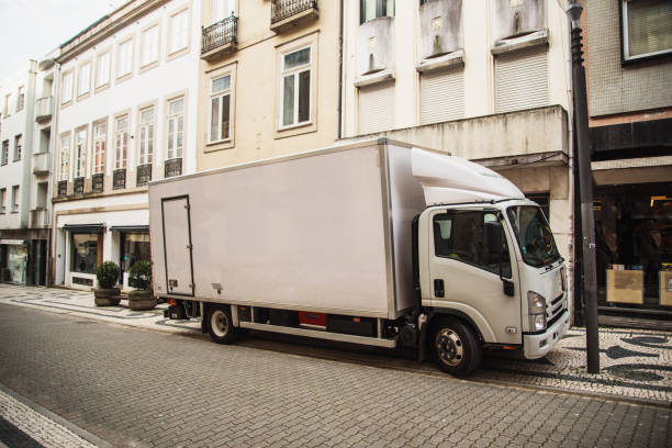 istock Delivery truck at city 1208610820
