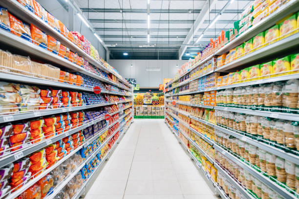 Stocked Supermarket Stocked supermarket ready for business aisle stock pictures, royalty-free photos & images
