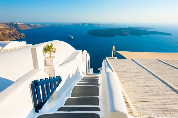 istock White architecture and blue sea on Santorini island, Greece. 1208617424
