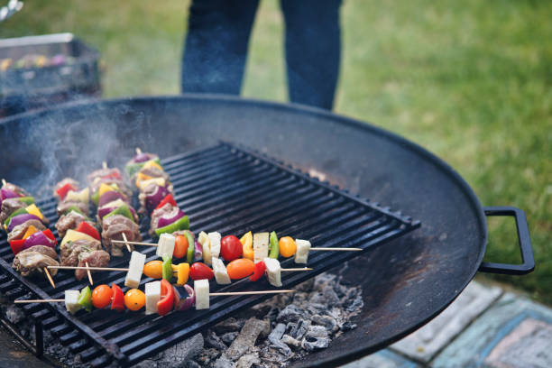 istock Roasting Lamb, Beef and Vegetarian Kebab on Barbecue Grill Outside 1208620630