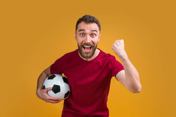 istock Young attractive bearded man betting at bookmaker's website 1208621641