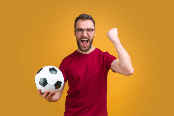 istock Young attractive bearded man betting at bookmaker's website 1208621768