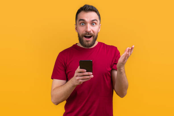 istock Young attractive bearded man betting at bookmaker's website 1208621903