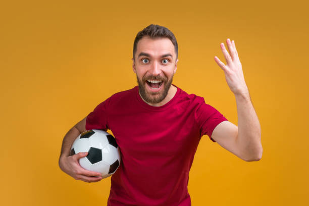 istock Young attractive bearded man betting at bookmaker's website 1208621936