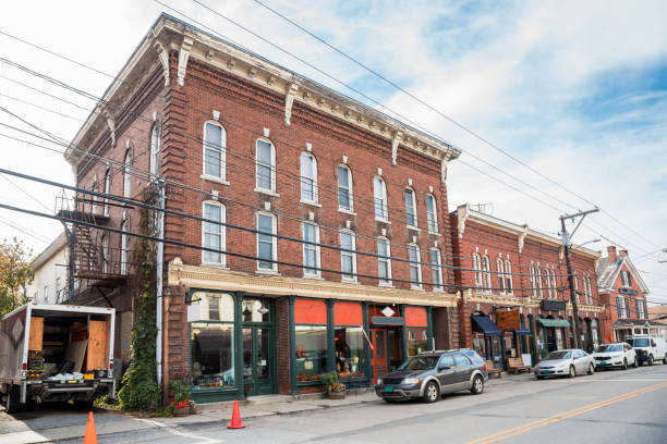 istock Traditional architecture with shops on ground floor along a street 1208622667