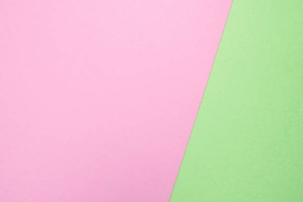 istock Pink and green empty geometric paper background. 1208623921